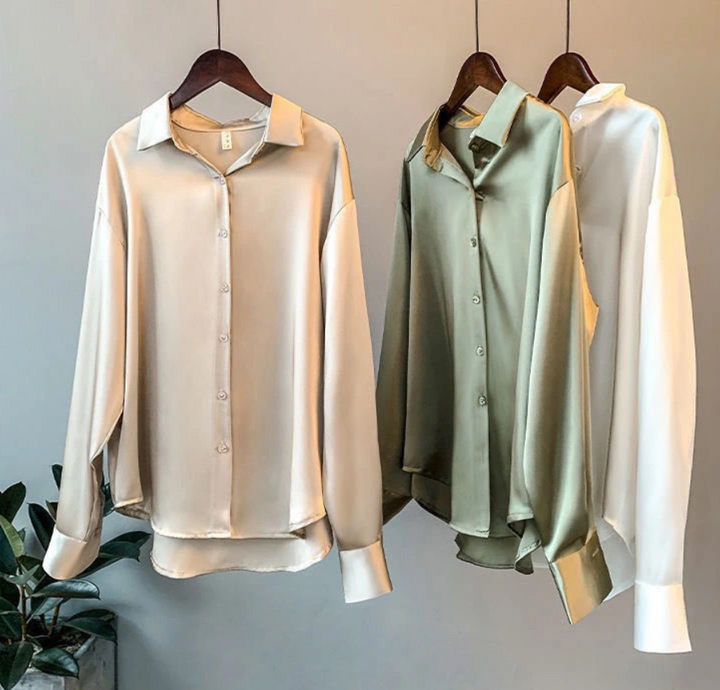 Premium silk long-sleeve blouse for women. Luxurious classic top, ideal for elegant fall fashion & workwear.
