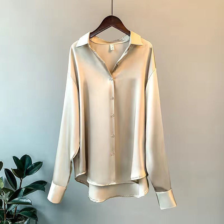 Elegant women's silk classic blouse. Luxurious long-sleeve top, perfect for fall office fashion & workwear.