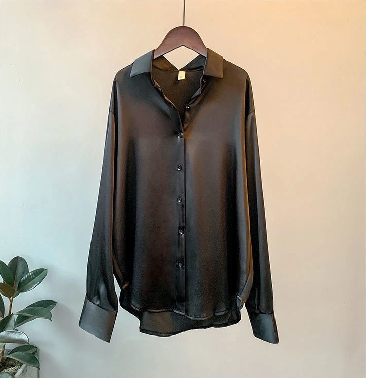 Sophisticated women's silk fall blouse. Classic long-sleeve design, luxury apparel for elegant workwear.