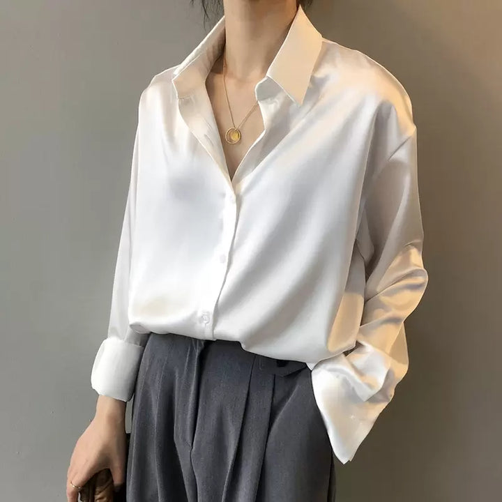 Women's luxurious silk classic fall blouse. Elegant long-sleeve top for office fashion & workwear.