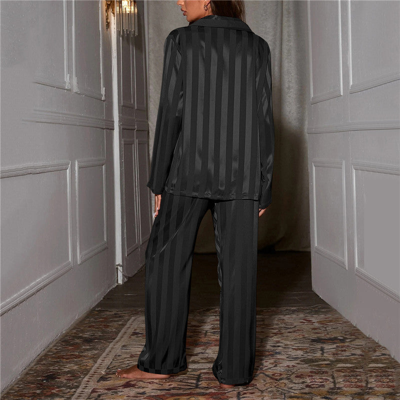 Back detail of a women's luxurious silk-feel pyjama set. Elegant & soft loungewear.