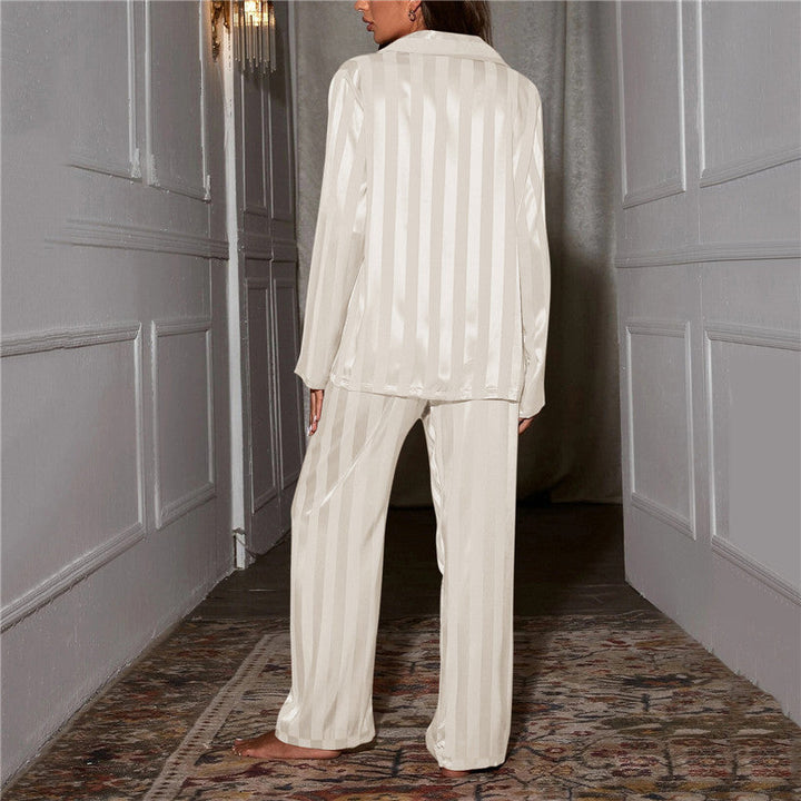 Flowing bottoms of a women's silk-feel pyjama set. Luxurious & comfortable loungewear for relaxation.