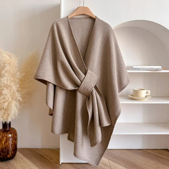Luxurious women's windproof poncho scarf coat. Elegant winter fashion & cozy wrap.