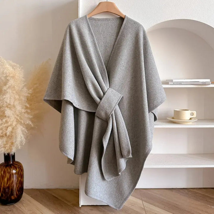 Versatile women's windproof poncho scarf coat, ideal luxurious outerwear for fall & winter.