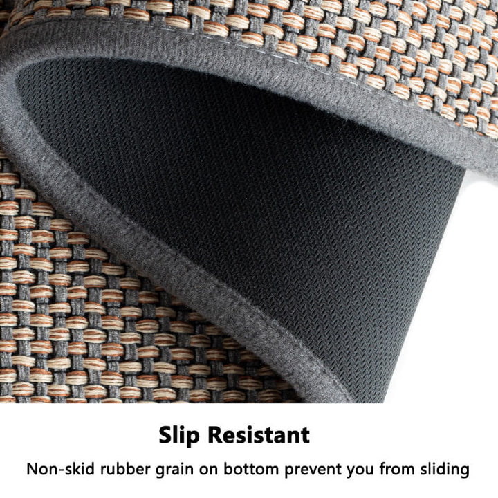 Machine washable woven indoor door mat with a timeless weave pattern, non-slip backing, and plush polypropylene surface.