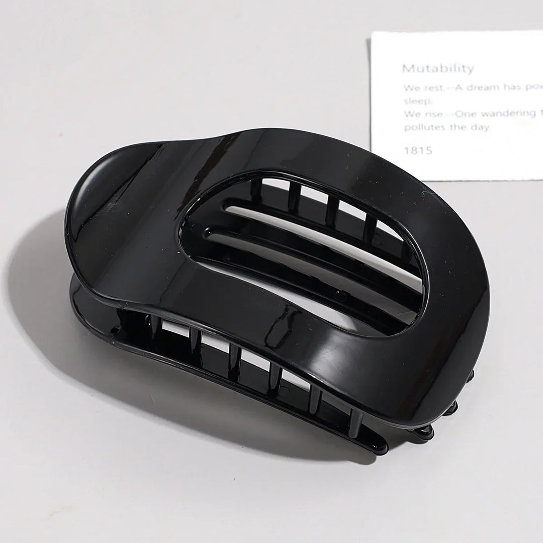 Oval matte hair ornament, a modern fashion claw clip for women's varied styles.