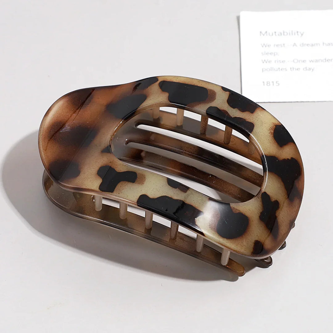 Versatile matte hair claw, oval duckbill clip for elegant hair accessories collection.