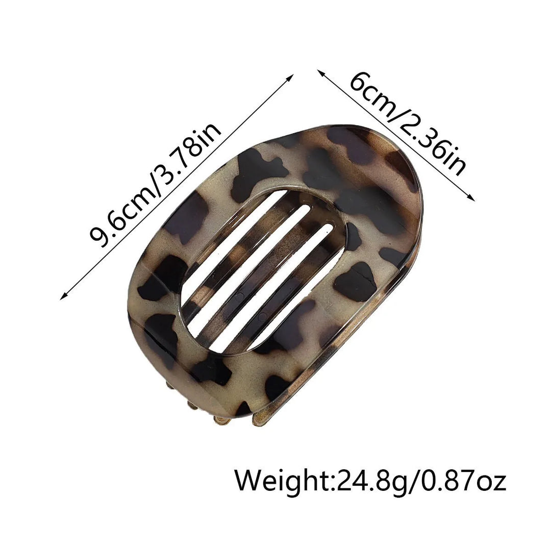 Women's oval matte hair claw, a chic hair accessory for daily elegant wear.