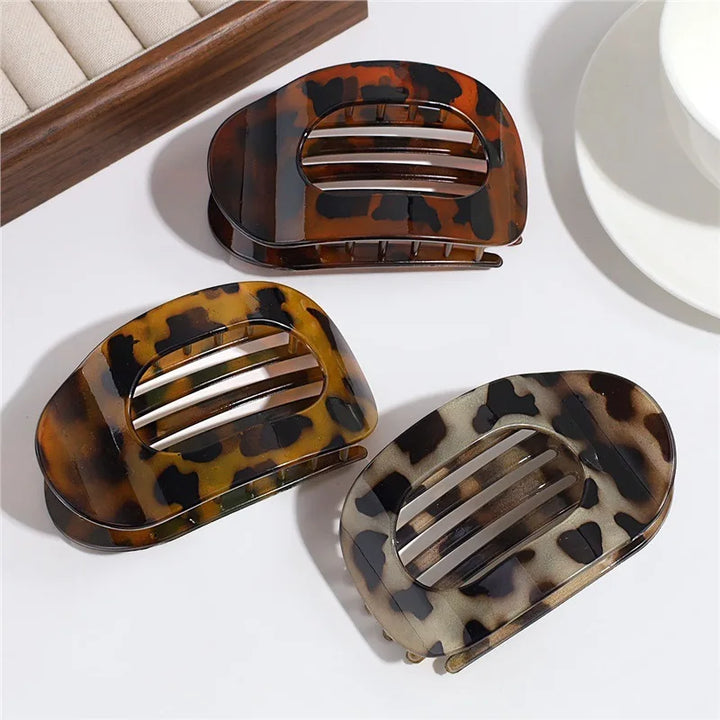 Secure hold matte flat duckbill clip, ideal for styling women's hair with ease.