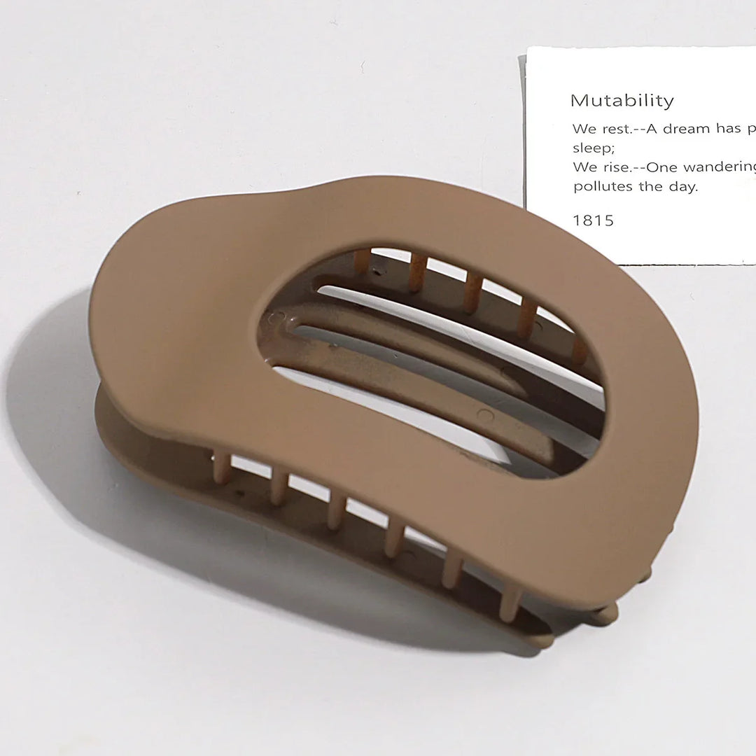 Chic matte hair ornament, oval duckbill clip for women's fashion statement.