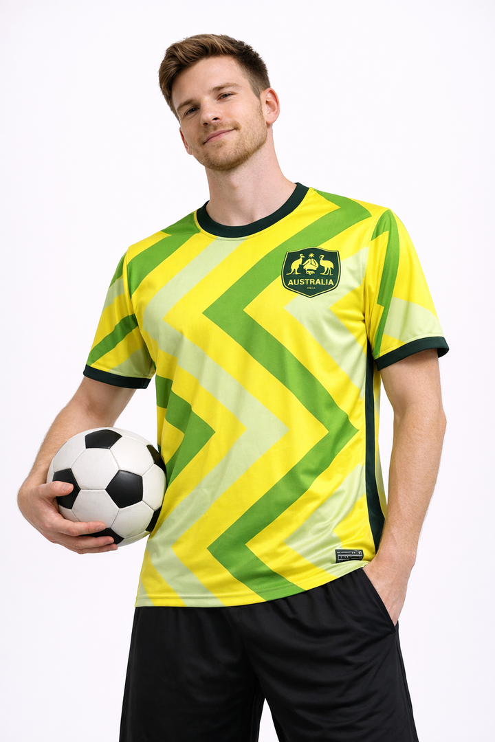 Men's Australia 2026 World Cup football jersey. Green and gold activewear for soccer fans.