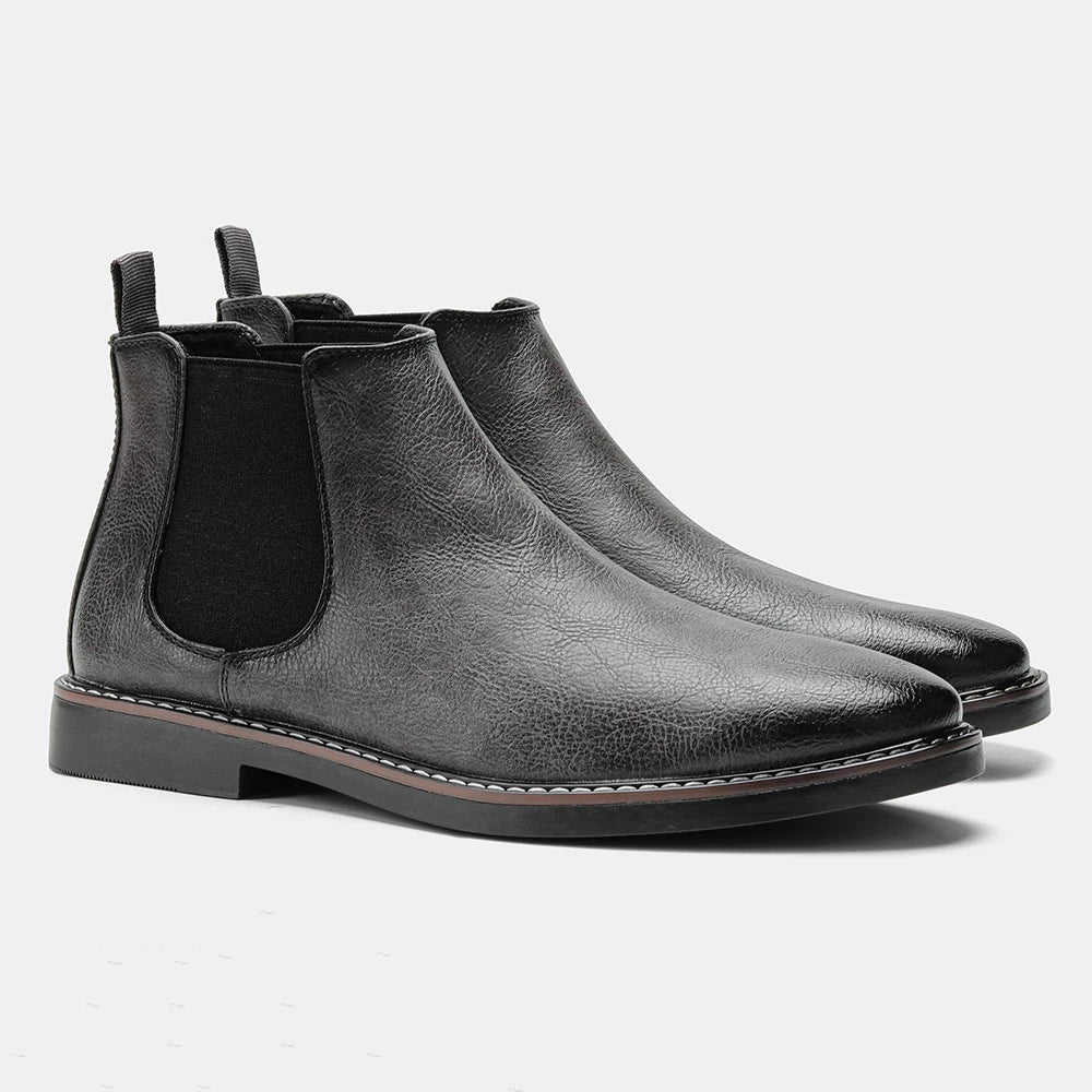 Durable men's leather Chelsea boots. Reliable slip-on ankle footwear, offering comfort and versatility for daily wear.