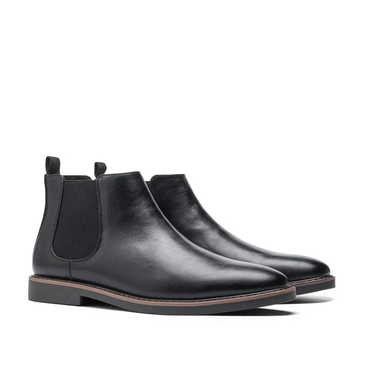 Modern men's Chelsea boots. Fashionable slip-on ankle style, perfect for versatile casual and dress looks.