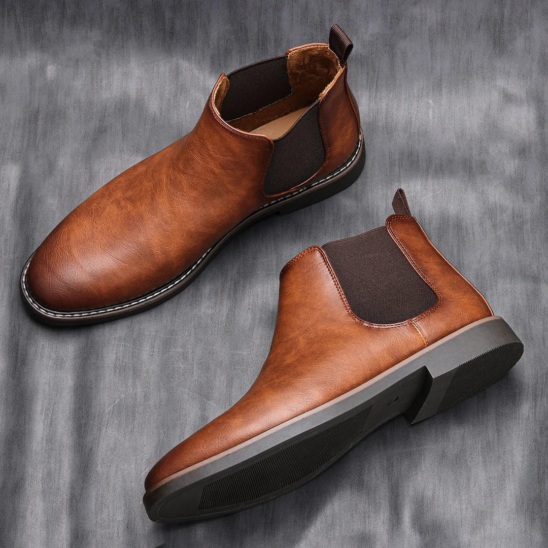 Stylish men's Chelsea boots. Perfect dress shoes, workwear, or casual footwear. Effortless slip-on design.