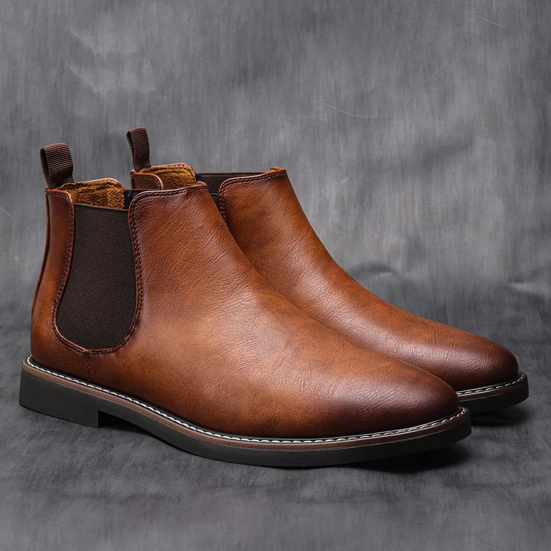 Man wearing stylish men's Chelsea boots. Comfortable fit and versatile look for any casual or dress occasion.