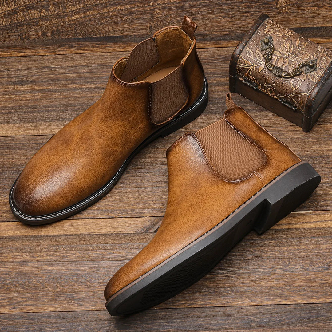 New pair of elegant men's slip-on Chelsea boots. Versatile footwear, perfect for casual wear, work, or dress.
