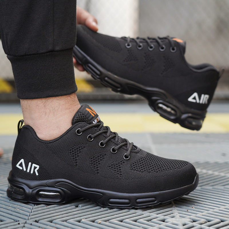 Protective men's lightweight black safety shoes. Water-resistant, steel-toe, & slip-resistant for workplace comfort & safety.