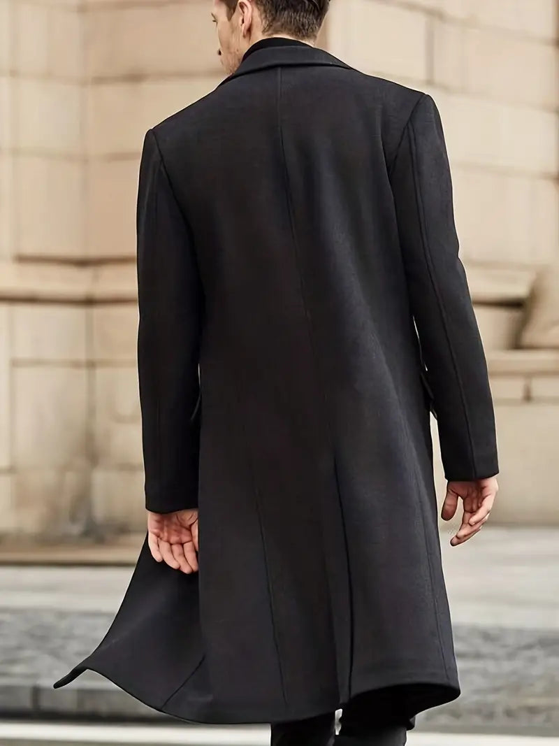 Elegant black men's slim fit trench coat. Features a classic notched lapel, perfect outerwear for business casual.