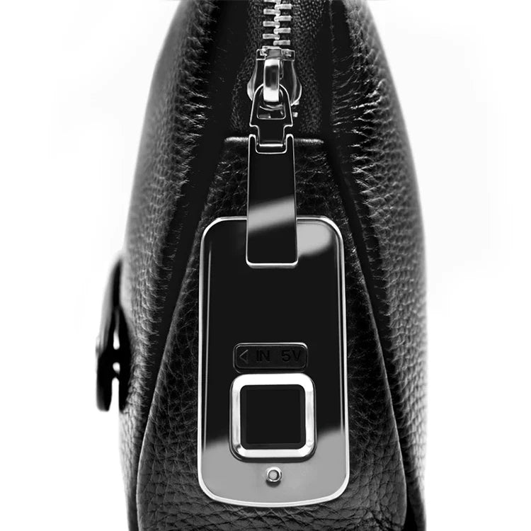 Secure men's blackish-blue leather anti-theft messenger bag, ideal for travel with its fingerprint lock.