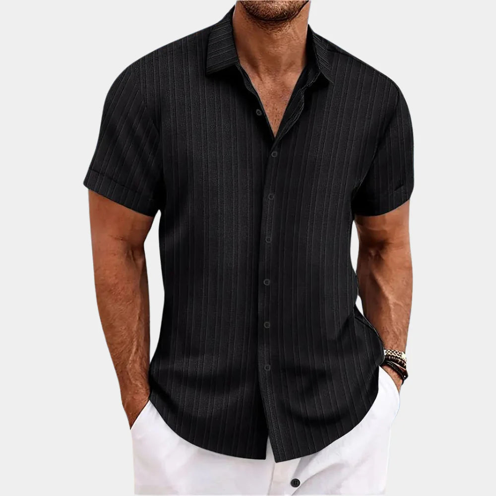 Casual men's button-up shirt, designed with breathable fabric for ultimate comfort in summer.