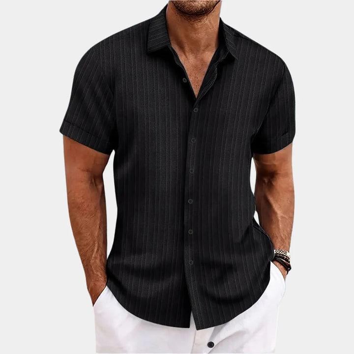 Casual men's button-up shirt, designed with breathable fabric for ultimate comfort in summer.