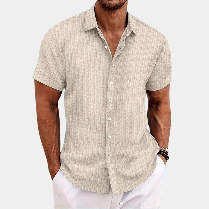 Versatile men's short-sleeve summer shirt, a relaxed fit button-up ideal for warm weather fashion.