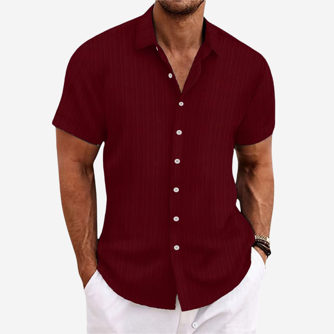 Men's fashion summer button-up shirt with short sleeves, offering a comfortable and versatile look.