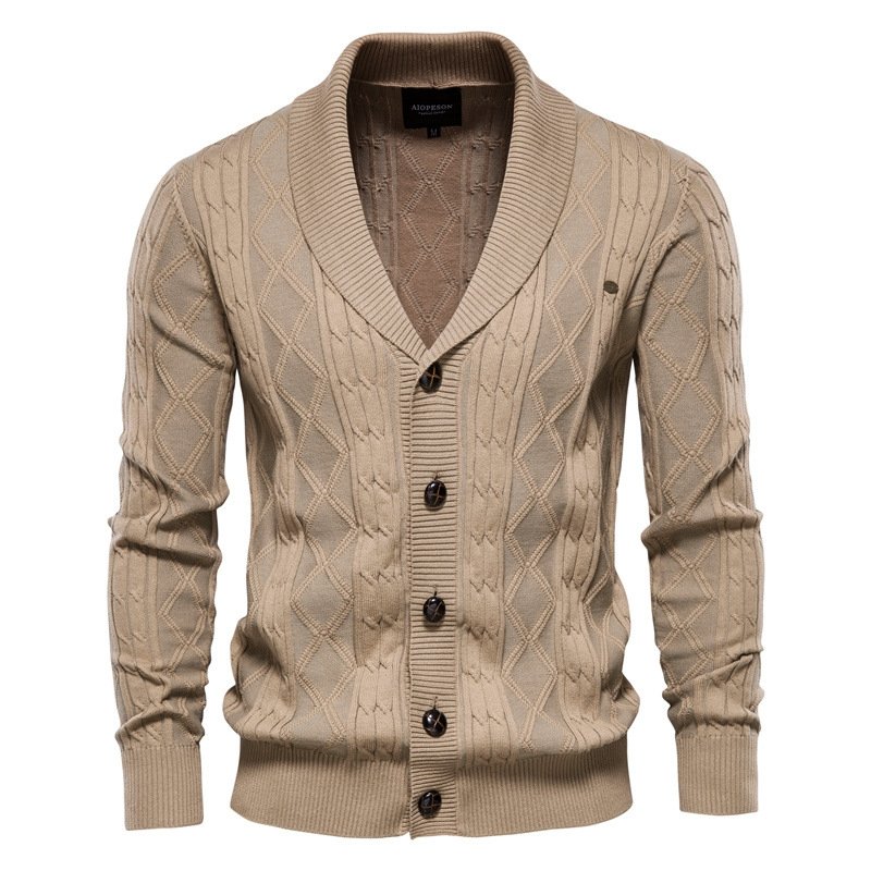 Well-tailored men's cable knit V-neck cardigan with a prominent shawl collar, ideal layering piece.