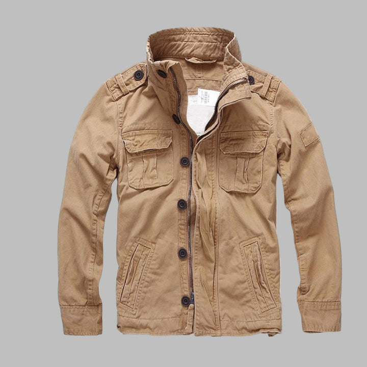 Close-up of a men's army camouflage jacket, showcasing rugged texture. Ideal spring outerwear for a military-style look.