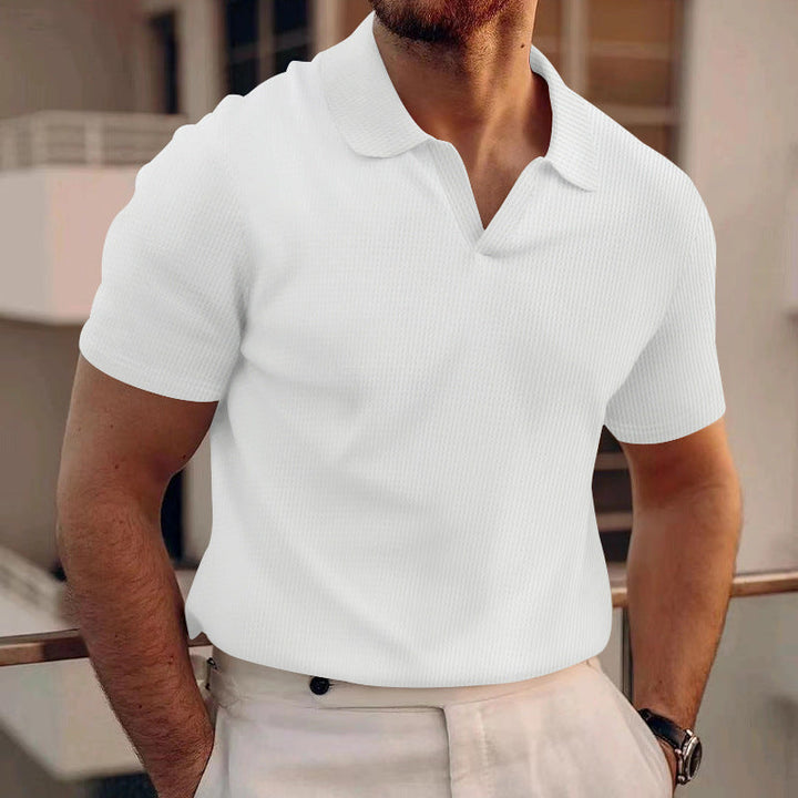 Men's classic fit polo shirt, short sleeve, button-up. Perfect for casual everyday wear.