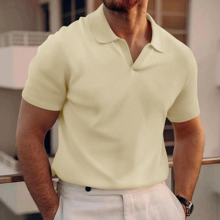 Stylish men's classic fit polo shirt for effortless summer style. Short sleeve, versatile top.