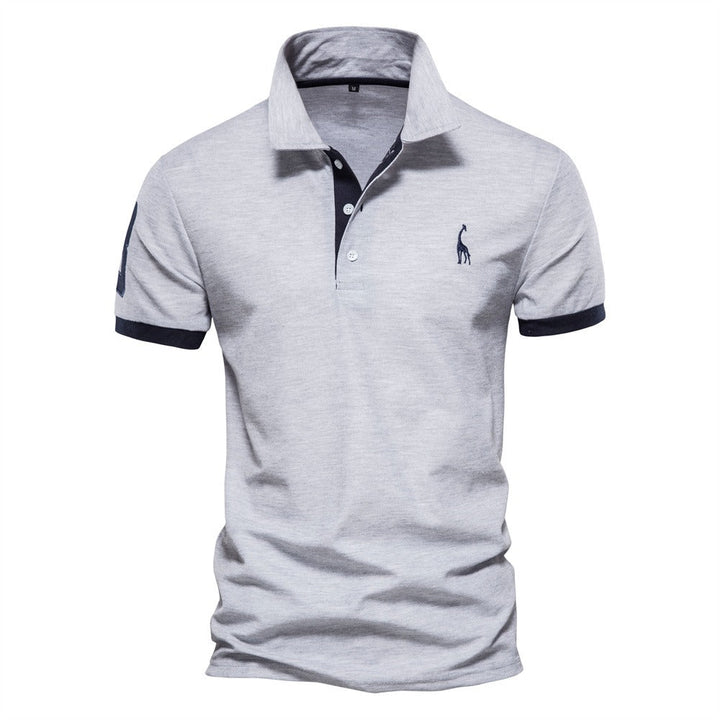 Men's stylish classic polo shirt, featuring a contrast collar. Essential menswear top for casual and smart-casual.