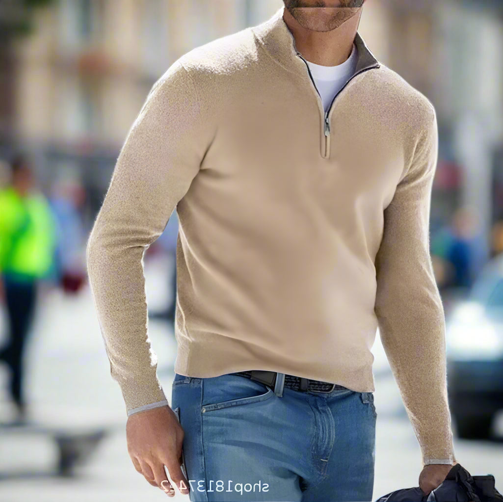 Close-up of the stylish quarter zipper on a men's knitwear sweater, highlighting its classic design.