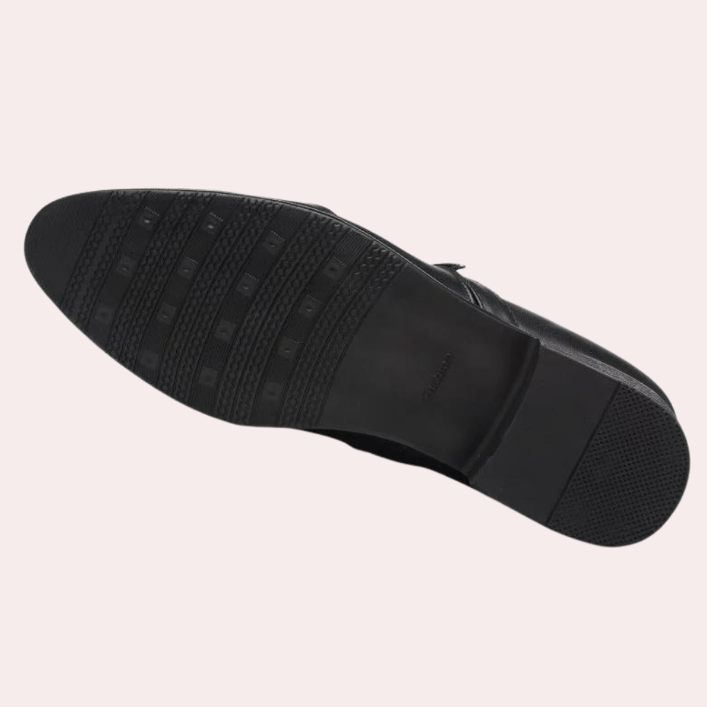 Brown men's classic slip-on loafers. Comfortable and stylish dress shoes for smart casual or formal wear.