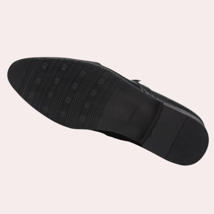 Brown men's classic slip-on loafers. Comfortable and stylish dress shoes for smart casual or formal wear.