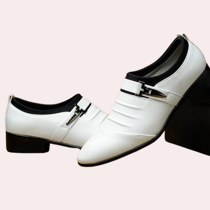 Men's classic slip-on loafers in black, brown & white. Stylish formal dress shoes for various occasions.
