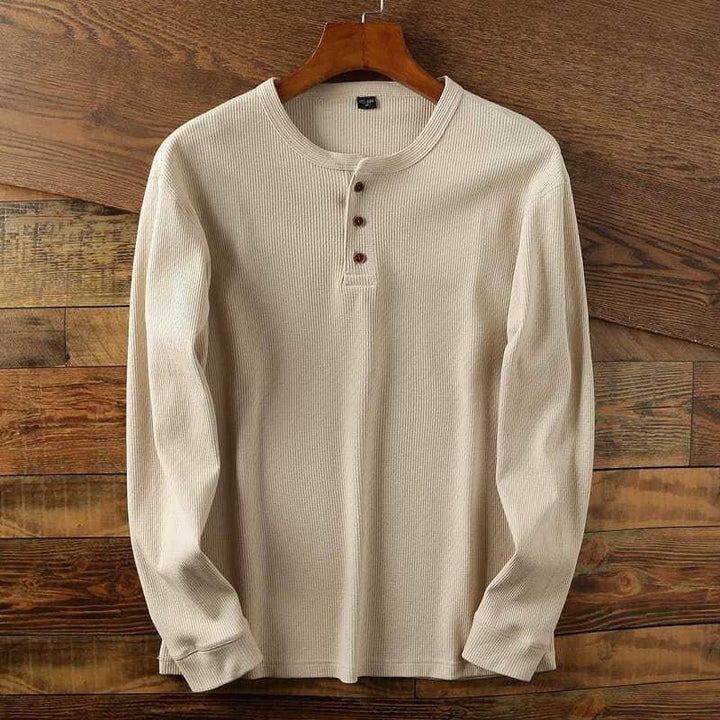 Soft men's comfort-fit henley shirt, a casual button-front top designed for ultimate everyday comfort.