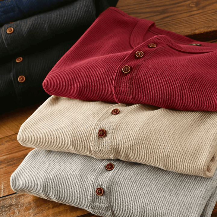 Modern men's comfort-fit henley top, a casual long-sleeve shirt blending style with everyday ease.