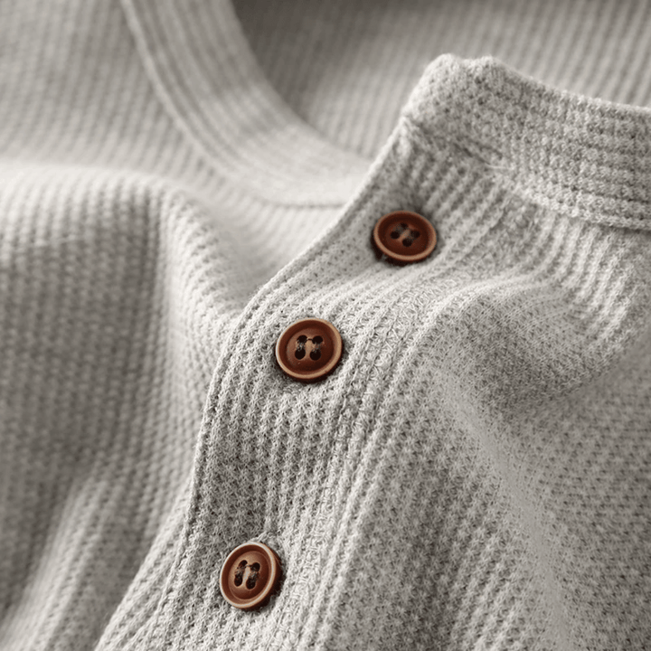 Effortless men's long-sleeve henley shirt. Comfort-fit, button placket. Perfect casual everyday top.
