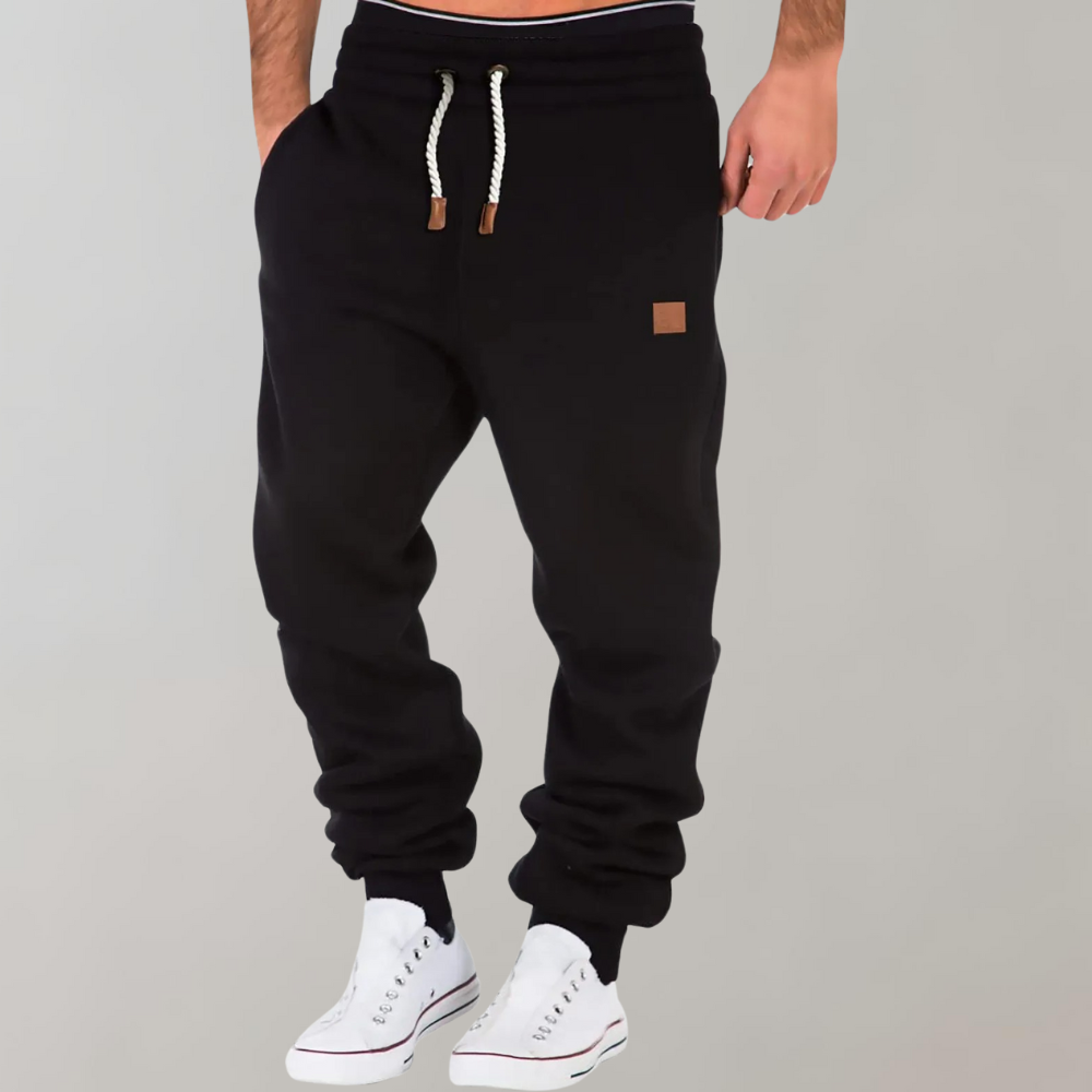 Men's comfortable athletic joggers in black, ideal for training, gym, running, or casual wear.