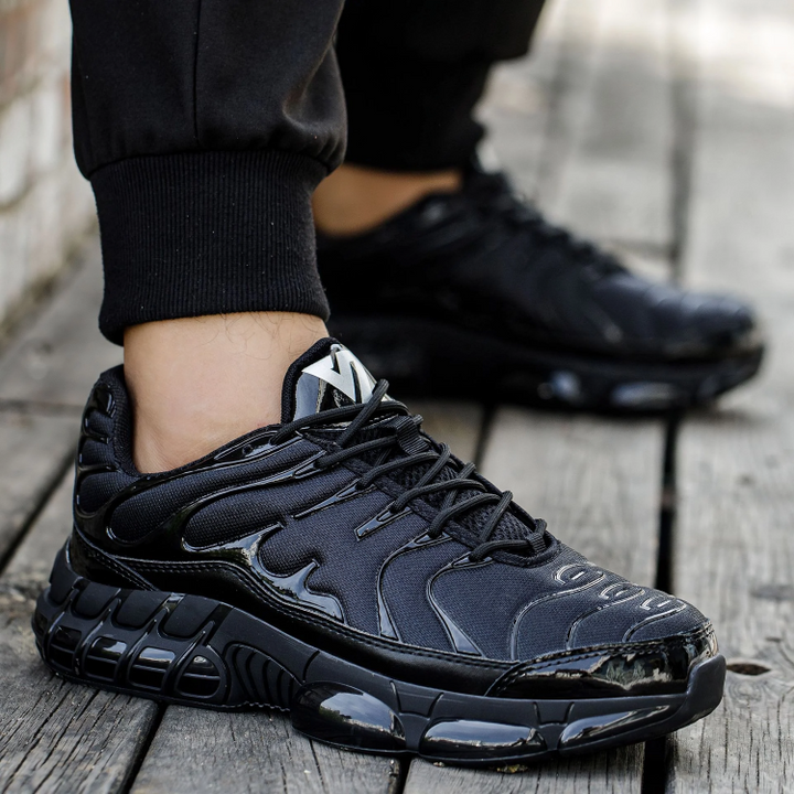 Close-up of men's steel toe safety work shoe, showcasing enhanced protective footwear for construction sites.