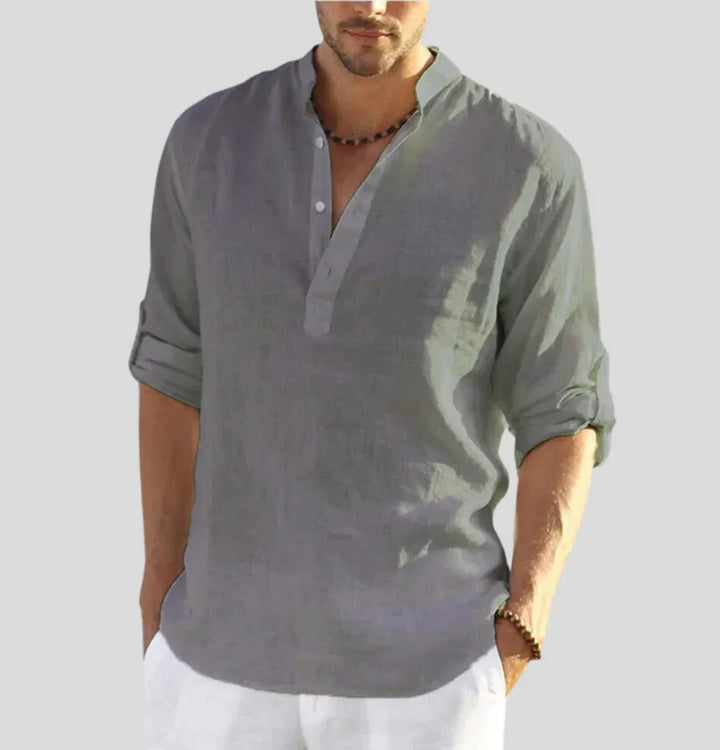Close-up of Hugo Luxe men's linen button-down shirt. Comfortable, elegant long-sleeve perfect for warm weather.