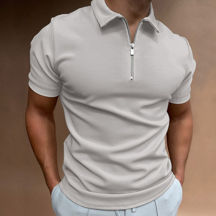 Stylish men's fitted short-sleeve polo shirt with a unique modern zip collar, enhancing casual style.