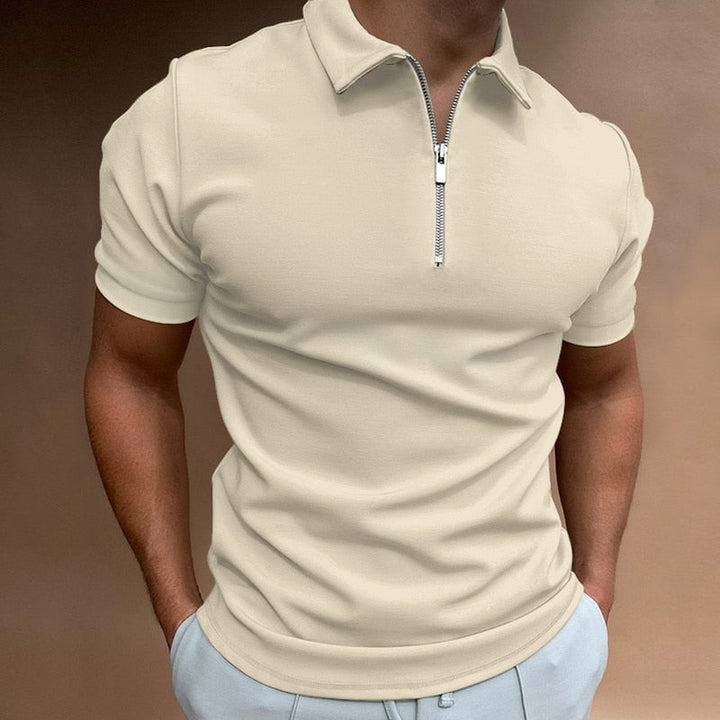 Classic men's fitted polo shirt updated with a modern zip collar, ideal for a refined casual look.