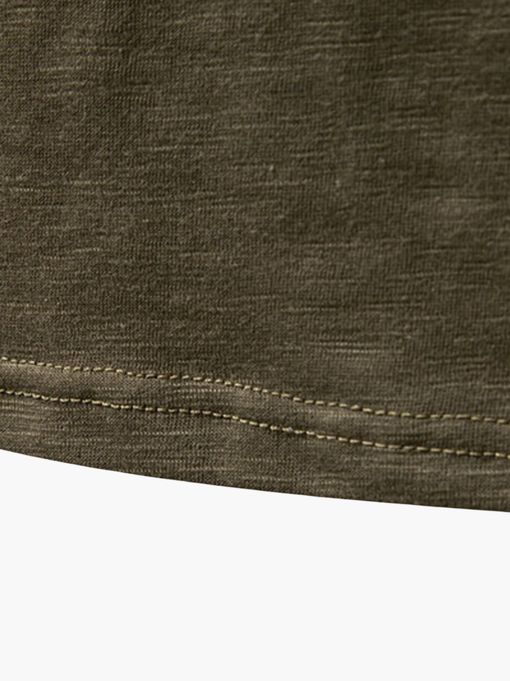 Versatile men's Henley long sleeve shirt for everyday fashion. Great for a layered or casual look, offering comfort.