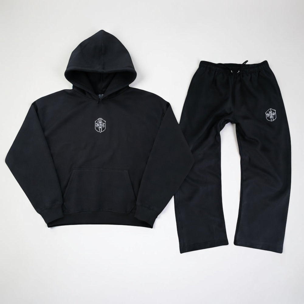 Men's hooded full body tracksuit in soft gray fabric, perfect for ultimate lounging comfort at home.