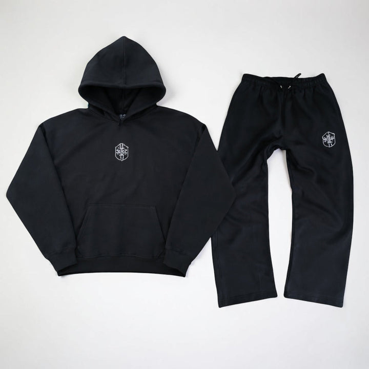 Men's hooded full body tracksuit in soft gray fabric, perfect for ultimate lounging comfort at home.