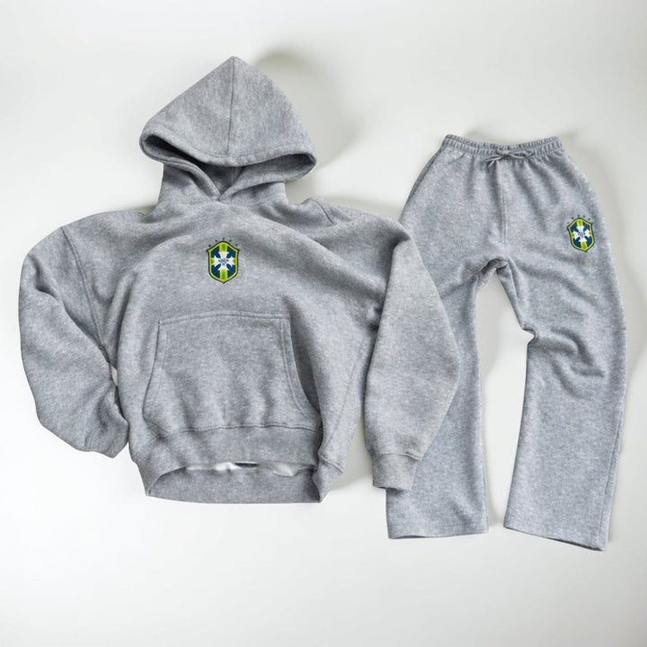 Stylish men's hooded full body loungewear suit in black, combining comfort with modern men's fashion.