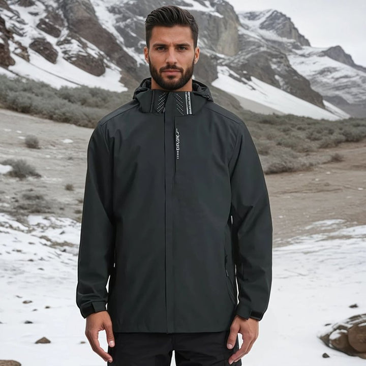 Front view of men's hooded rain jacket with prominent zipper & spacious pockets.