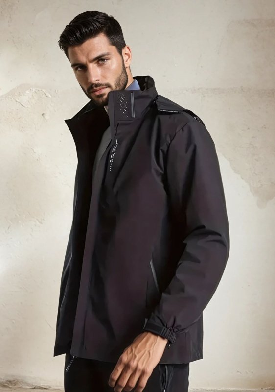 Functional zippered pockets on men's lightweight rain jacket, keeping your essentials safe & dry.